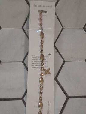 Gold Stainless Steel Oval Link Bracelet with Star Charm